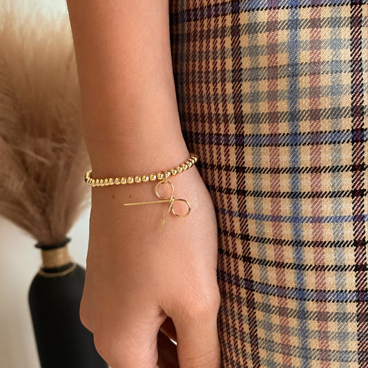 Bow Knot Ball Bracelet in 14k Gold Filled · Ribbon Jewelry