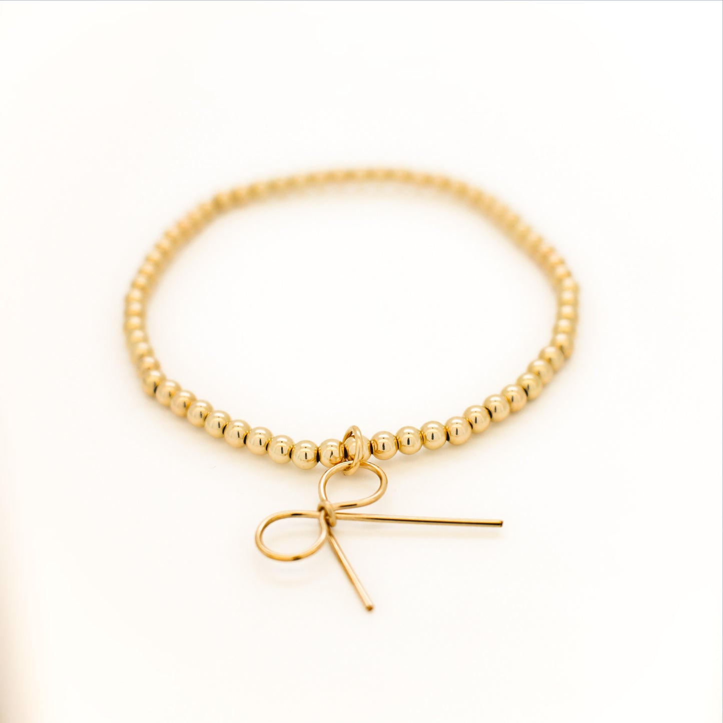 Bow Knot Ball Bracelet in 14k Gold Filled · Ribbon Jewelry