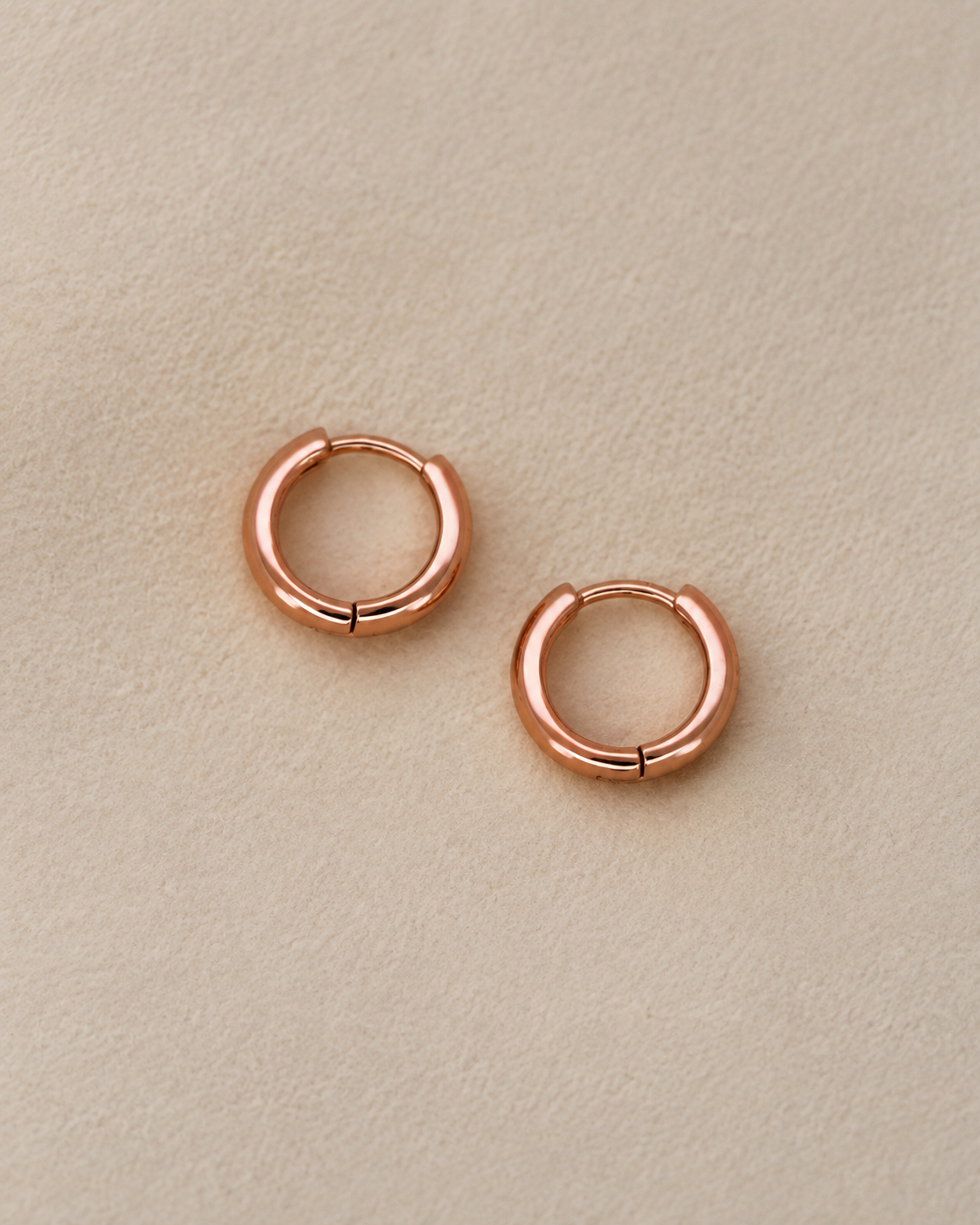 12mm Rose Gold Hoop Earrings · Sterling Silver Baby Huggies