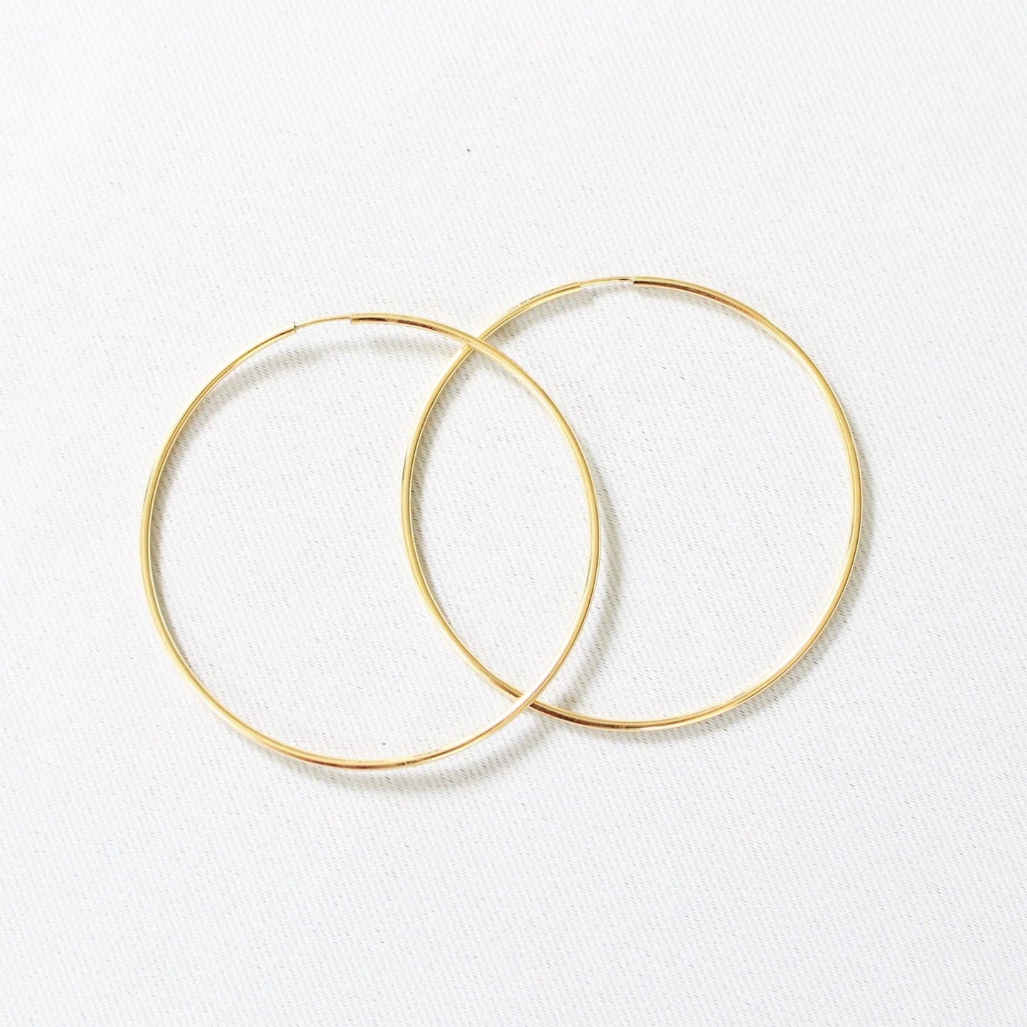 14kt gold filled hoops earrings 50 mm ∙ Minimalist large Creole earrings ∙ 1 pair ∙ Long lasting earrings thin big hoops