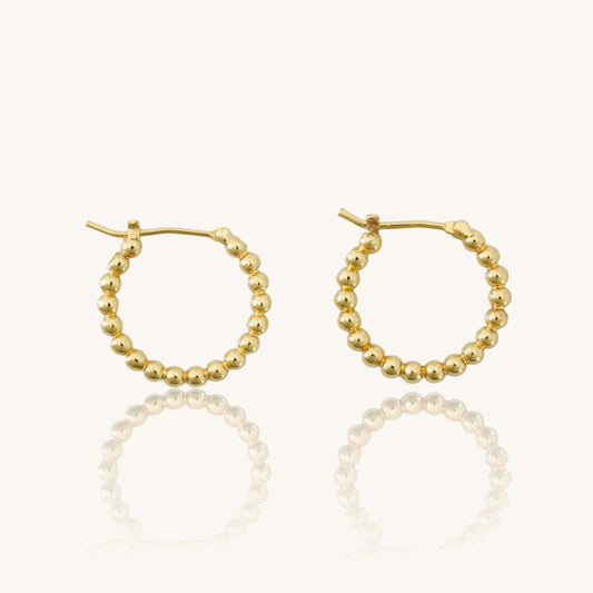 JOY - 14 Karat Gold Earrings · Huggie beaded gold hoop